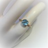 Geelgouden ring met ronde blauwe topaas