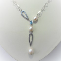 Zilveren ketting met blauwe...