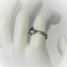 Ring met driehoekige blauwe topaas