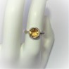 Ring met ronde citrien in dichte zetting
